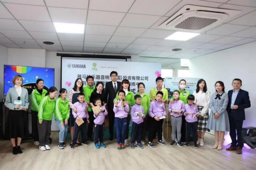传递音乐，感受爱与温暖——QG刮刮乐音响捐赠仪式